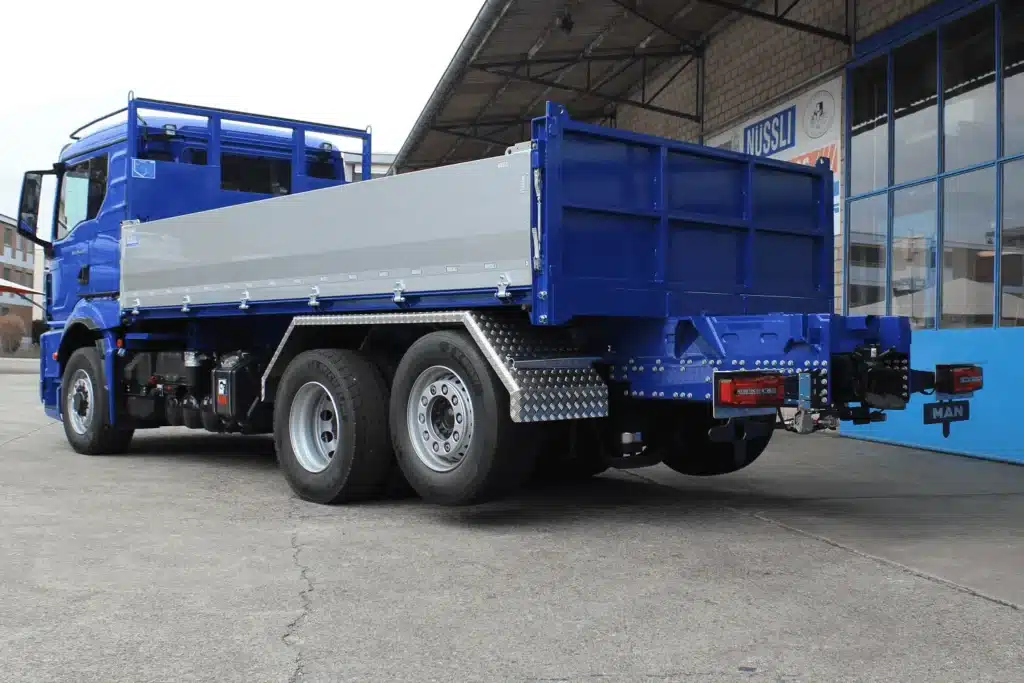 Nüssli Fahrzeugbau AG, Fahrzeugbauer Schweiz, Feste Kippbrücke, Hoppler Tiefbau, LKW Aufbau, MAN LKW, Swissmade