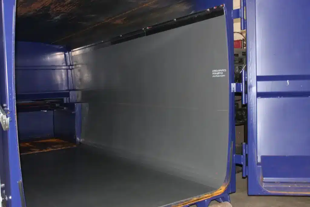 QuickSilver Muldenauskleidung in Presscontainer, Schweiz, Nüssli Fahrzeugbau AG